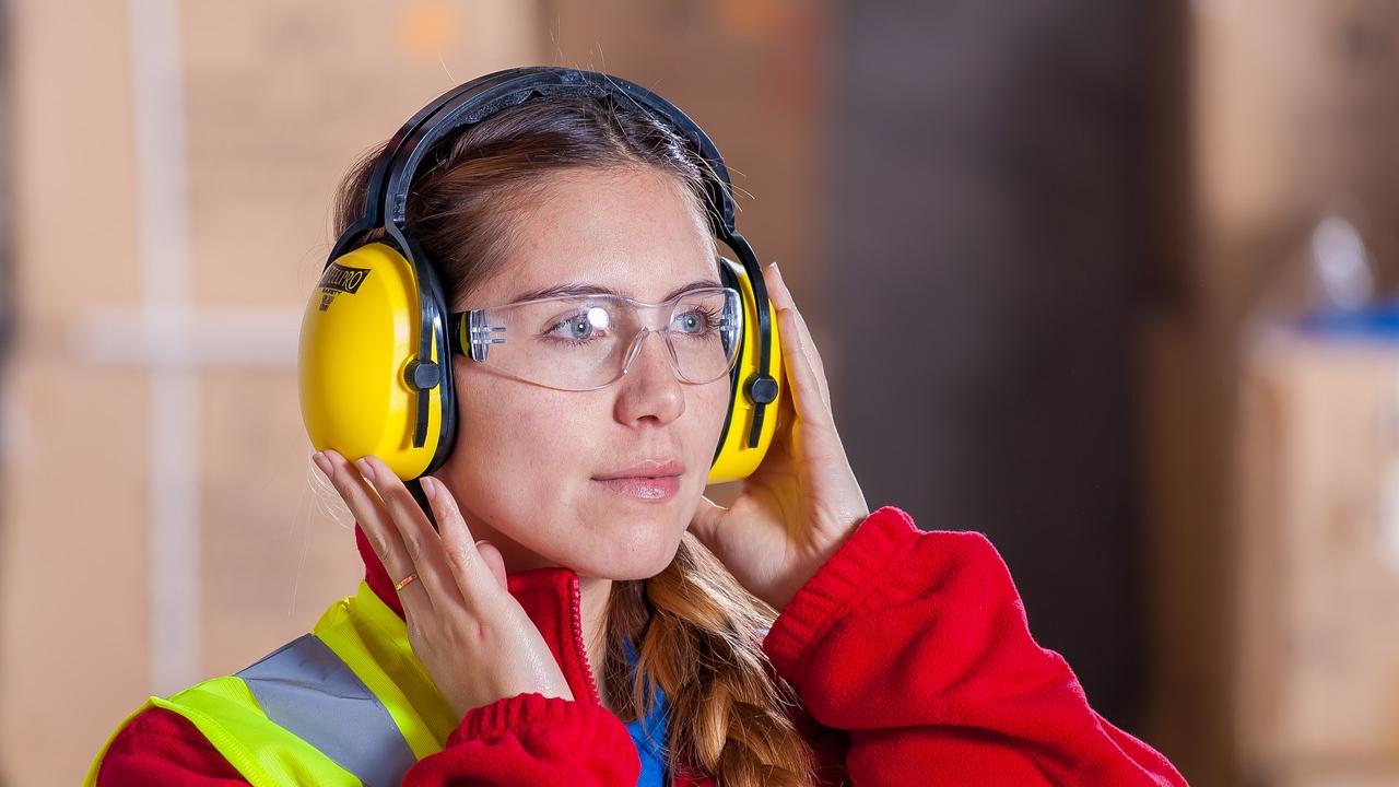 Female worker wearing hearing protection