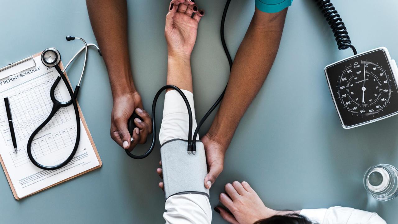 Patient getting their blood pressure taken