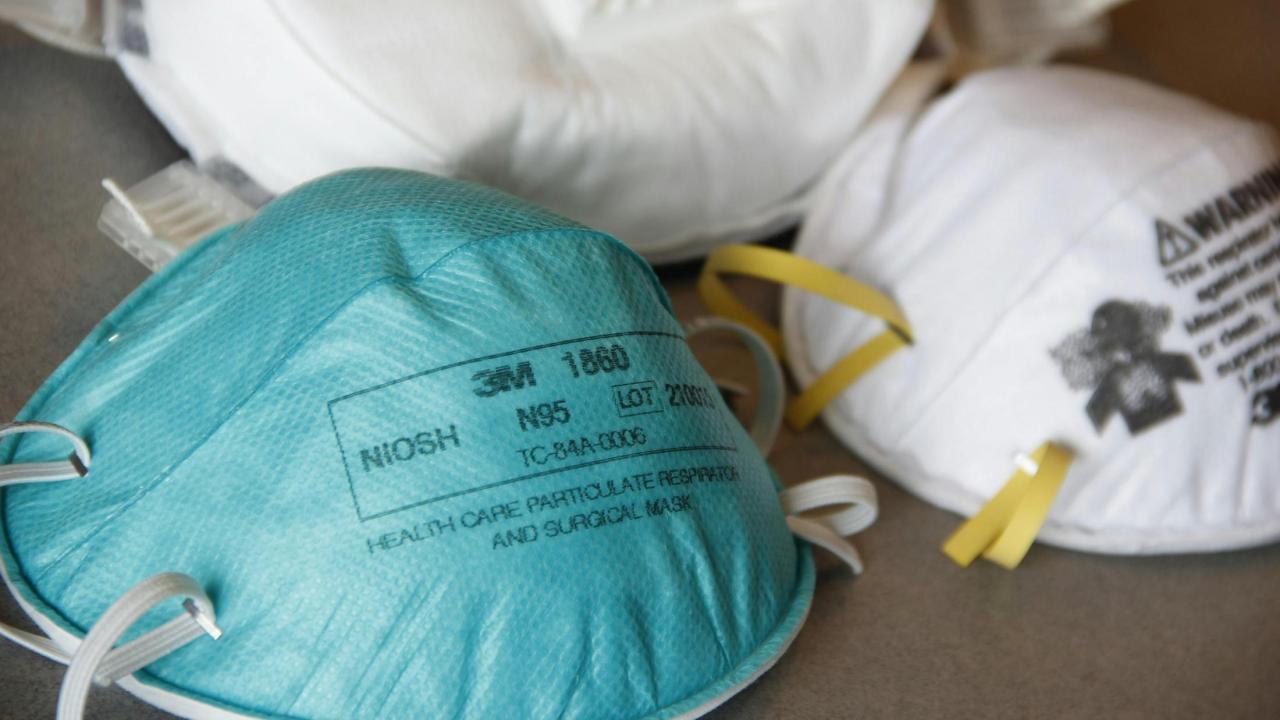 Different types of respirators pictured on a table