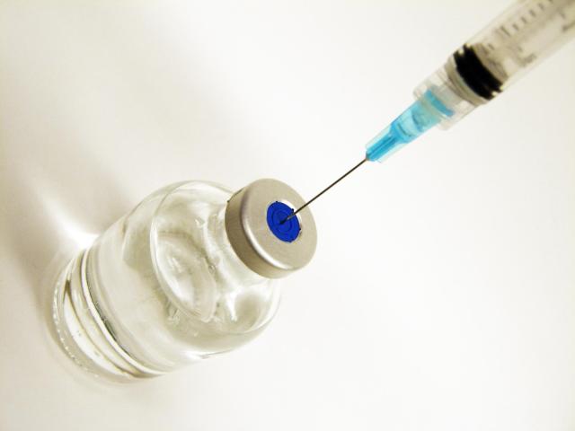 vaccine vile and needle